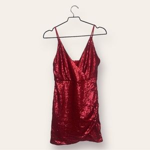 Red sequin tulip-hem mini dress